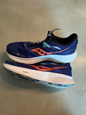 Saucony Navy Blue Running Sneakers with Orange Accents